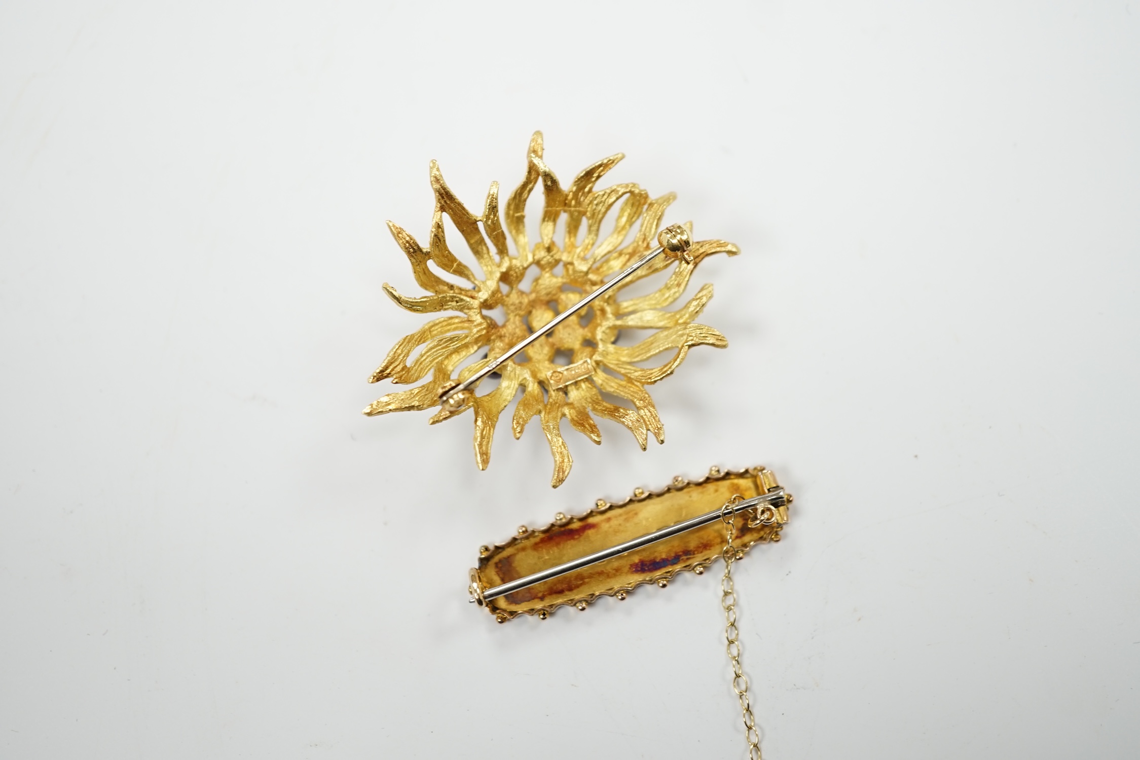 A continental 750 yellow metal and cultured pearl cluster set brooch, 44mm, gross weight 11.5 grams, together with a late Victorian three colour gold bar brooch, gross 2.4 grams.